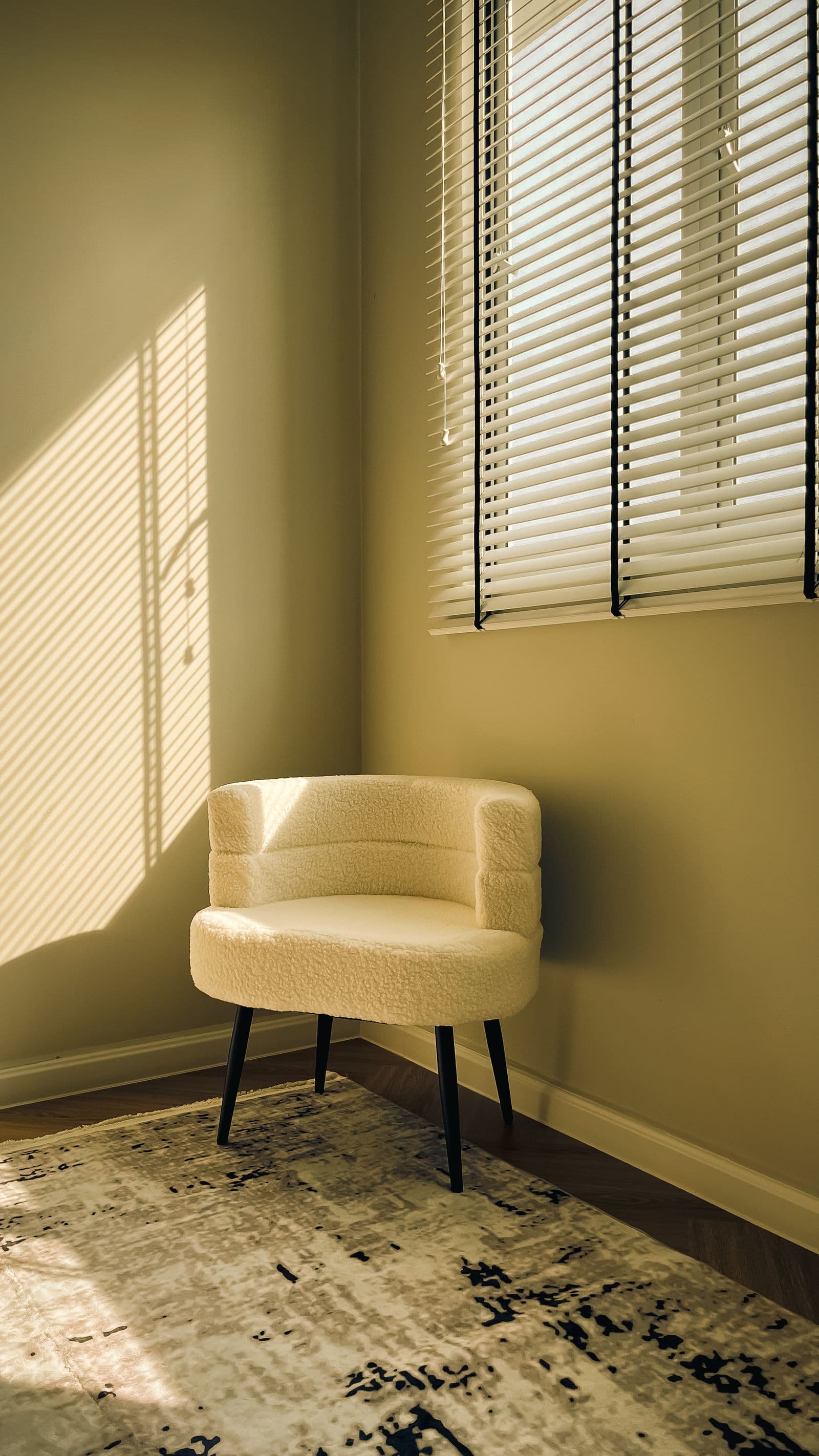 Original interior photograph of a cream accent chair